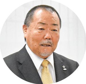 4月10日号記事3_隈部会長近影